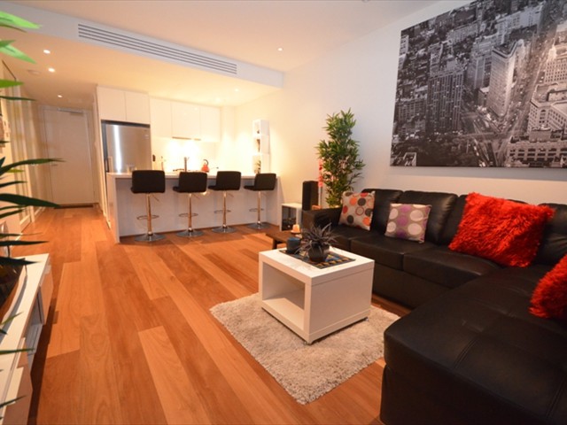 ABODE: Modern decor, light, quality furniture, wood flooring throughout