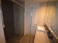 Modern bathroom with spacious walk-in shower 1200 x 90cm Monsoon Rain shower